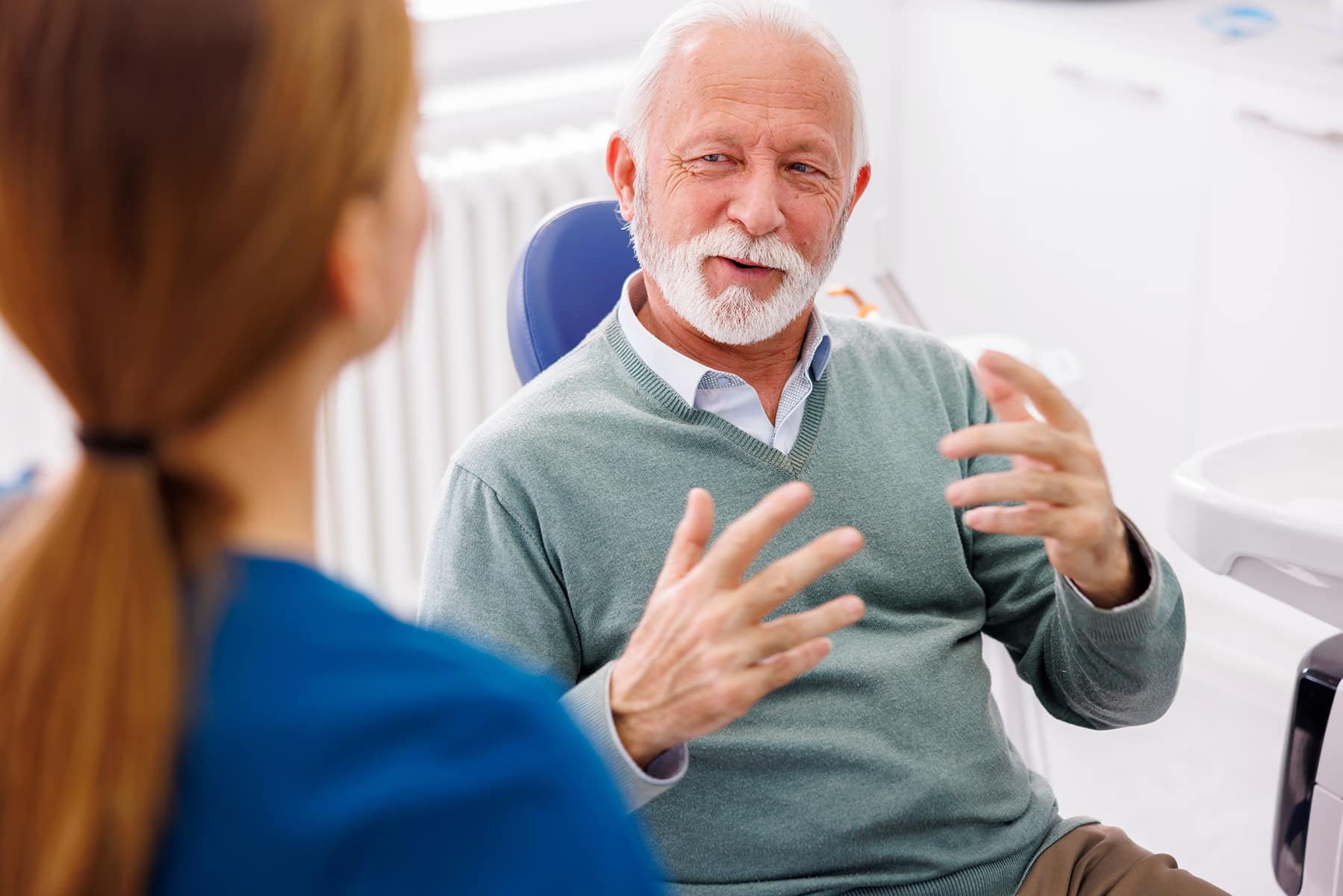 Man at a dental implant consultation in Grand Bay, AL