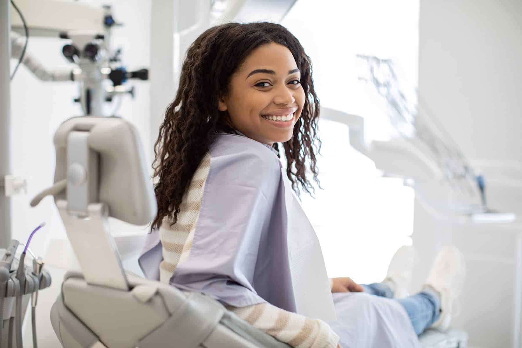 Woman at the restorative dentist in Grand Bay, AL