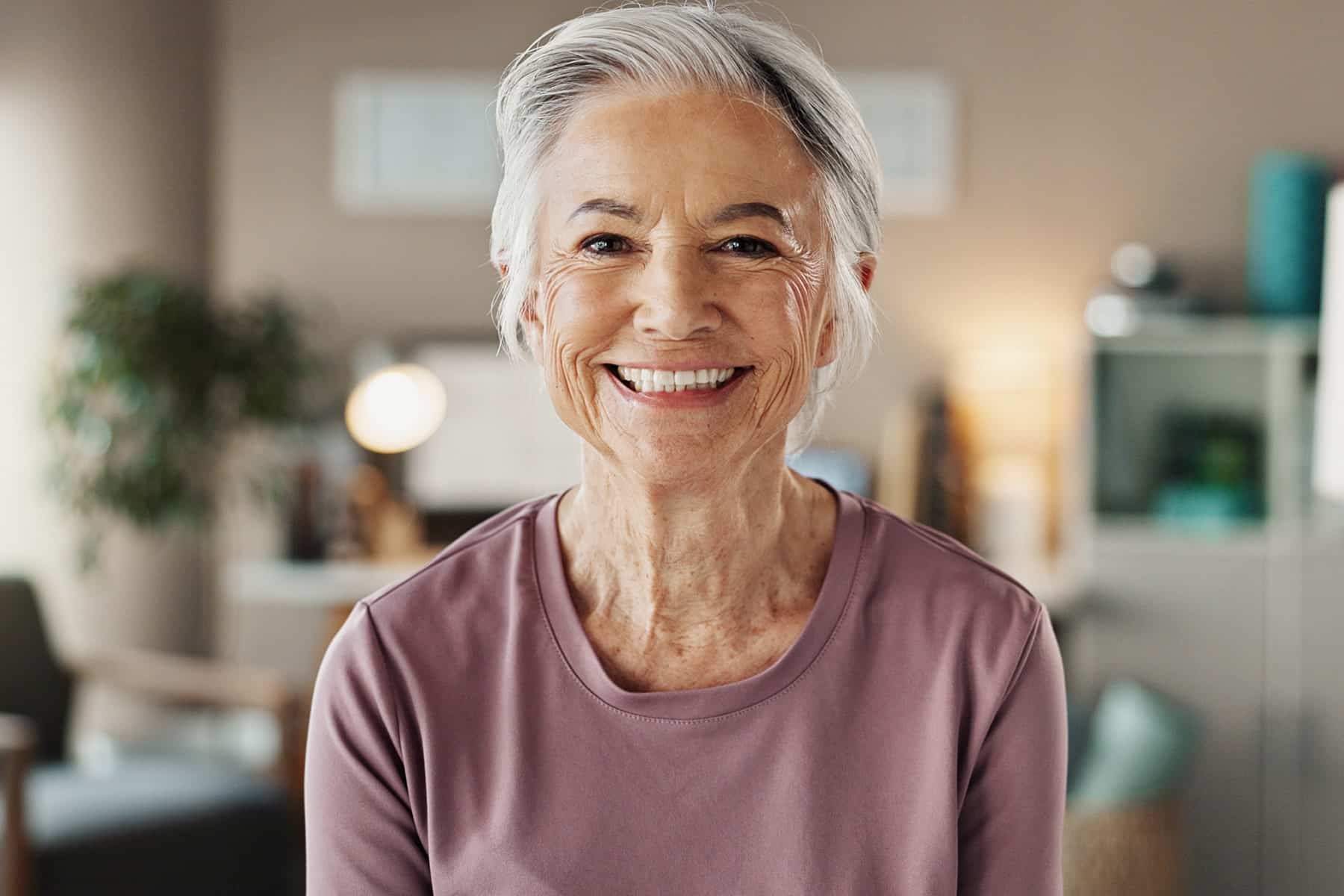 Woman with snap-in dentures in Grand Bay, AL